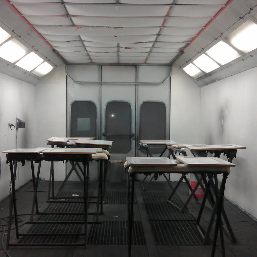 A spray booth typically used to control dust and remove harmful vapour from paint materials